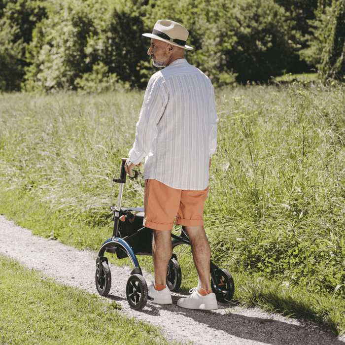 Rollator de Carbono Saljol Ultraligero – Andador Premium con Frenos Ajustables, Ruedas de 25 cm, Bolsa Extraíble y Reflectores – Tallas M y L – Hasta 150 kg