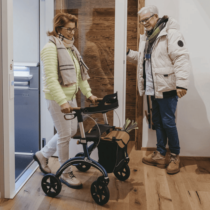 Rollator de Carbono Saljol Ultraligero – Andador Premium con Frenos Ajustables, Ruedas de 25 cm, Bolsa Extraíble y Reflectores – Tallas M y L – Hasta 150 kg