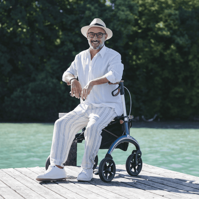 Rollator de Carbono Saljol Ultraligero – Andador Premium con Frenos Ajustables, Ruedas de 25 cm, Bolsa Extraíble y Reflectores – Tallas M y L – Hasta 150 kg